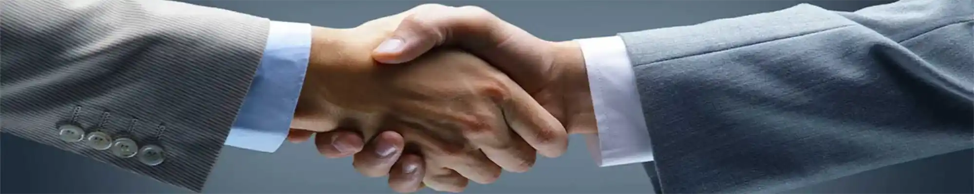 Selling My Home Palm Beach County Florida Selling With Us 2 Men Shaking Hands Gray Suits