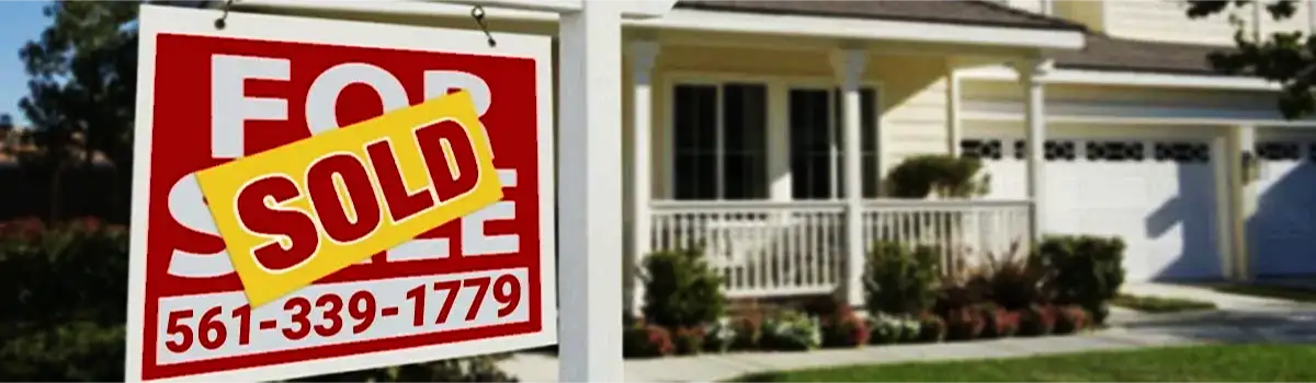Sold Listings Sign in Yard of House For Sale Image